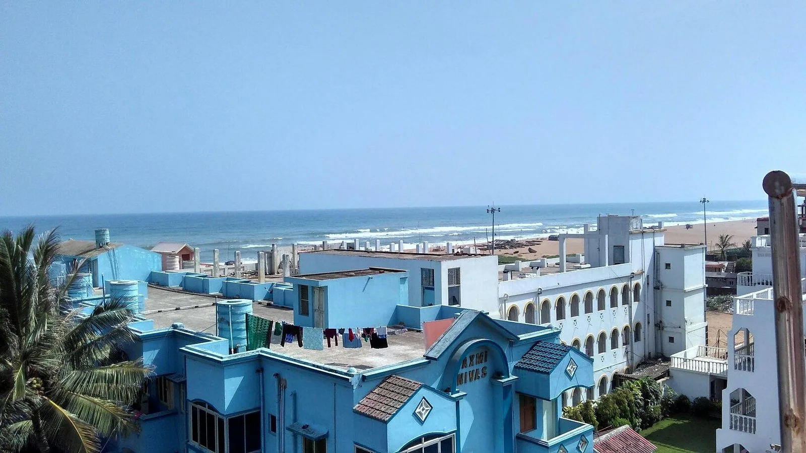 Rooftop outlook over Puri towards the sea