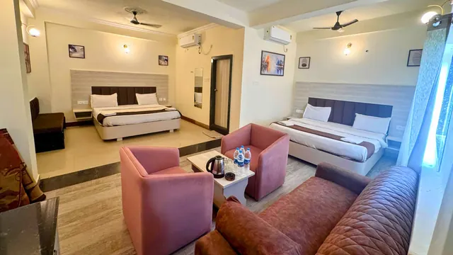 Suite seating area beside the bedroom